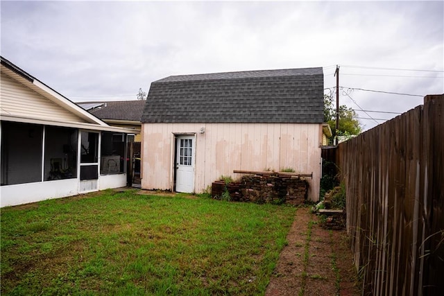 view of outdoor structure featuring a yard