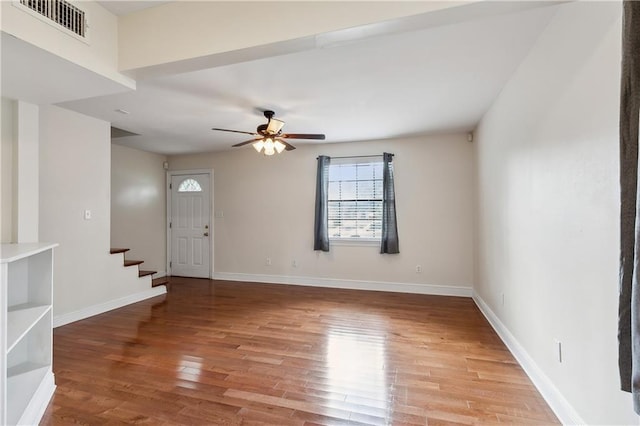 unfurnished room featuring light hardwood / wood-style floors and ceiling fan