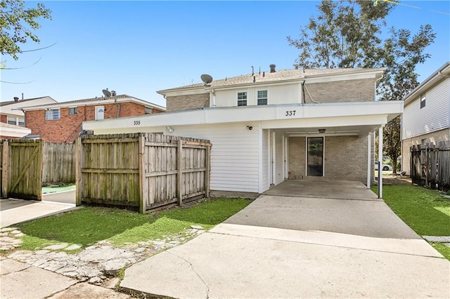 exterior space featuring a carport