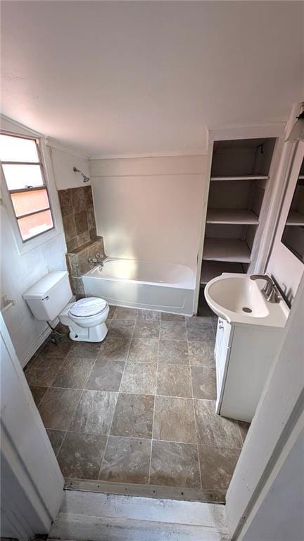 full bathroom with shower / tub combination, vanity, and toilet