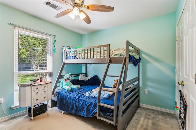 carpeted bedroom featuring ceiling fan