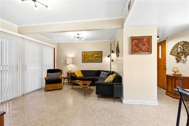 living room featuring crown molding