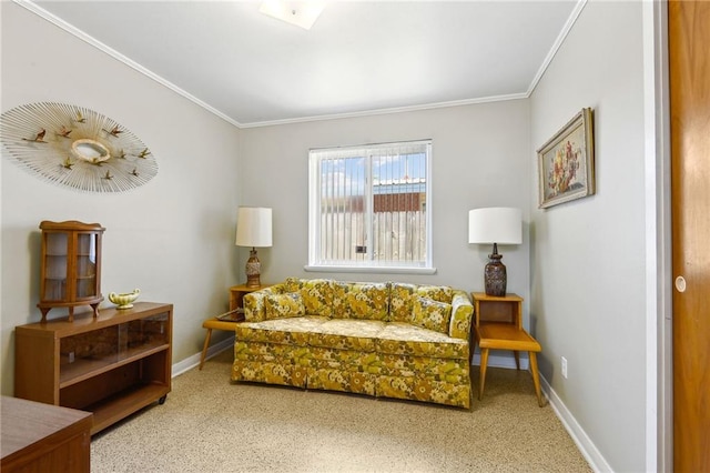 sitting room featuring crown molding