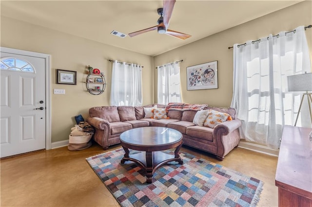 living room featuring ceiling fan