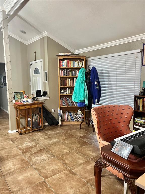 sitting room with ornamental molding