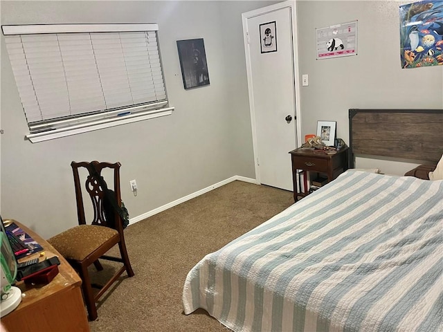 bedroom with dark carpet