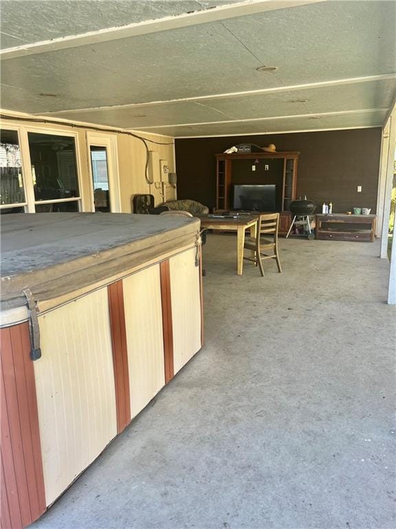 view of patio with a hot tub