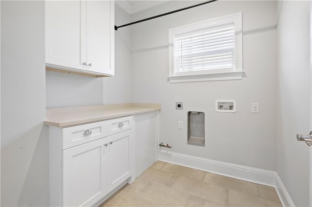 clothes washing area featuring hookup for an electric dryer, hookup for a gas dryer, cabinets, and hookup for a washing machine