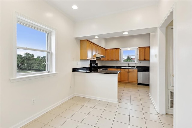 kitchen featuring dishwasher, black range with electric stovetop, sink, light tile patterned floors, and kitchen peninsula