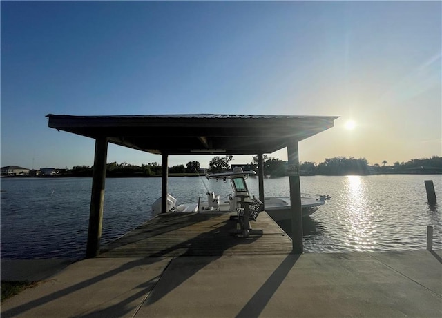 dock area with a water view