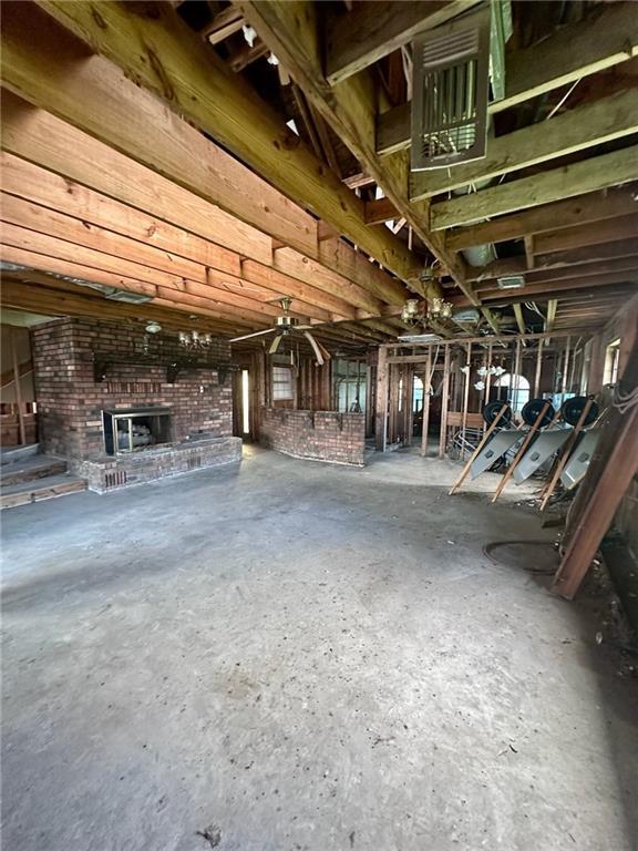 interior space featuring a brick fireplace