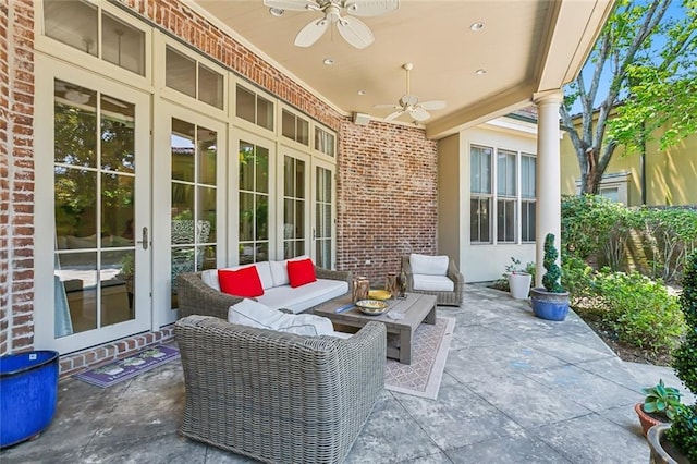 view of patio with ceiling fan, an outdoor living space, and french doors