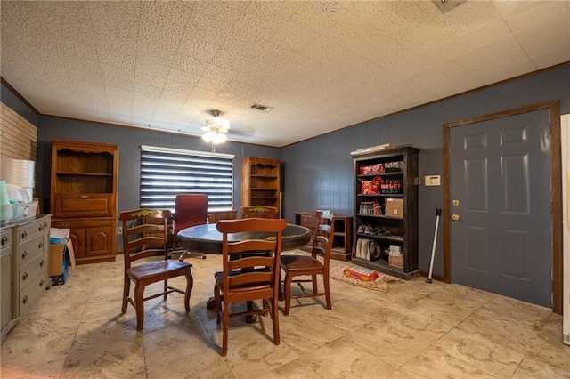 dining room with ceiling fan