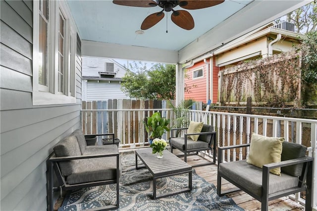 exterior space with an outdoor hangout area and ceiling fan