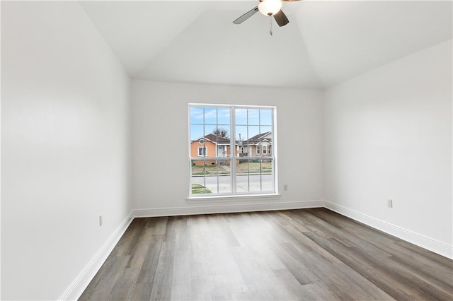 unfurnished room featuring vaulted ceiling, hardwood / wood-style floors, and ceiling fan