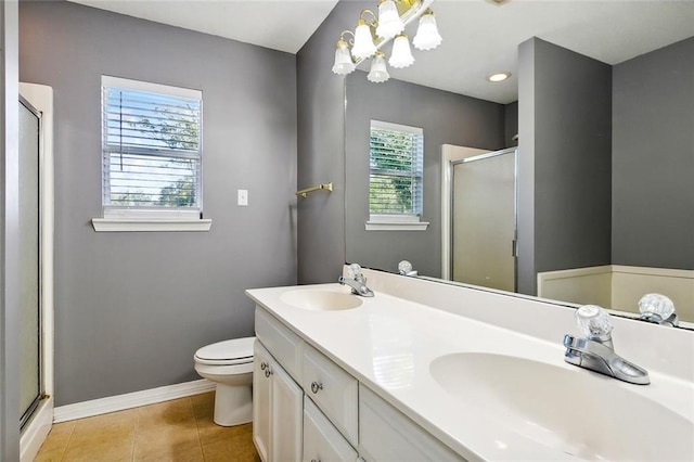 bathroom with tile patterned flooring, toilet, an enclosed shower, and a chandelier