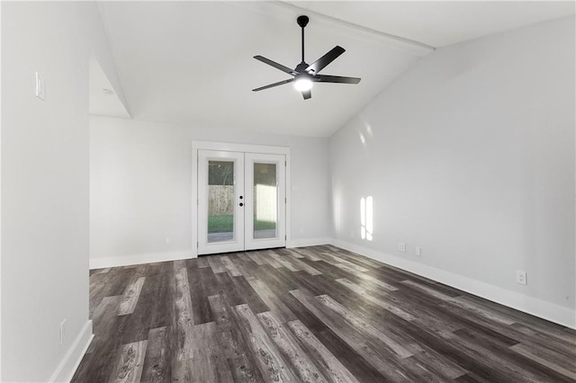 empty room featuring ceiling fan, vaulted ceiling, dark hardwood / wood-style flooring, and french doors