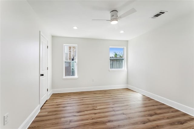 7470 Briarheath Dr, New Orleans, LA 70128 - empty room with a ceiling fan, baseboards, light wood finished floors, and recessed lighting