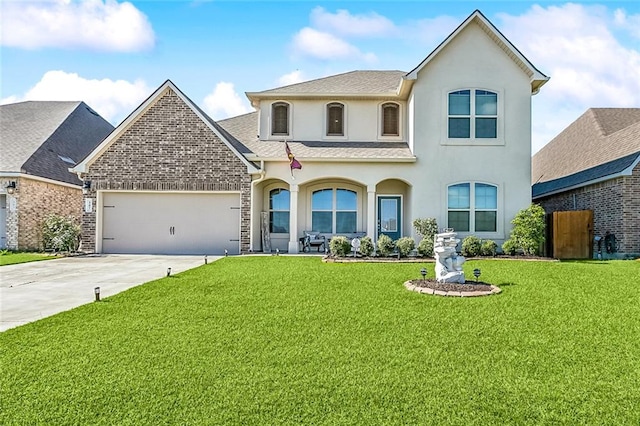 view of front facade featuring a garage and a front lawn