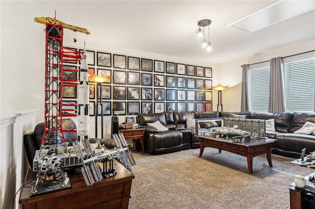 sitting room featuring carpet floors