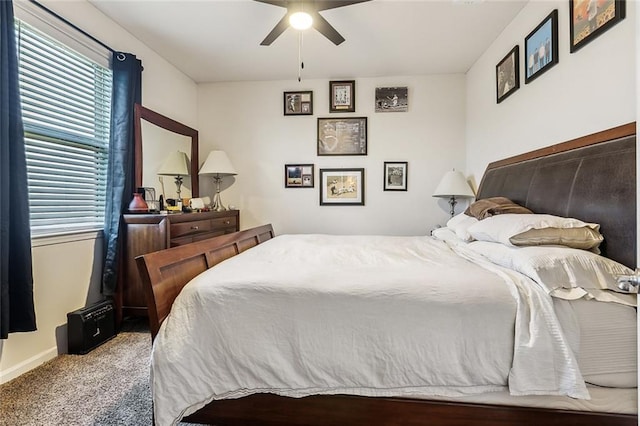 bedroom with ceiling fan and carpet floors