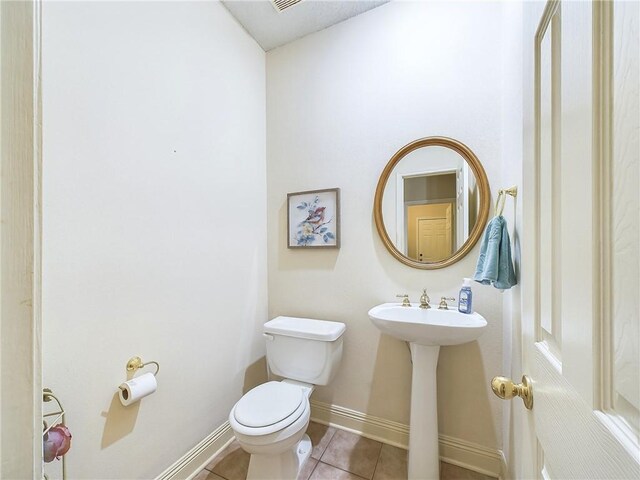 1024 Claire Dr, Slidell, LA 70461 - bathroom featuring toilet and tile patterned floors