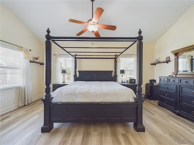 1024 Claire Dr, Slidell, LA 70461 - bedroom featuring lofted ceiling, light wood finished floors, and a ceiling fan