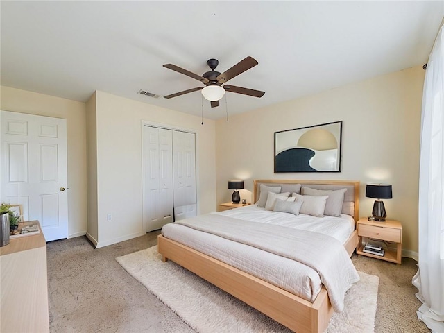 1024 Claire Dr, Slidell, LA 70461 - bedroom with light carpet, a closet, and ceiling fan