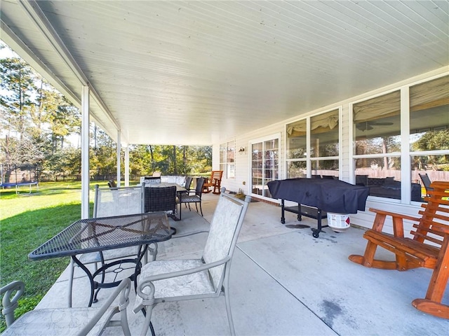 1024 Claire Dr, Slidell, LA 70461 - view of patio with outdoor dining space, a trampoline, and grilling area