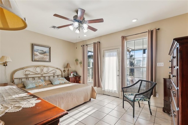 bedroom with light tile patterned floors and ceiling fan