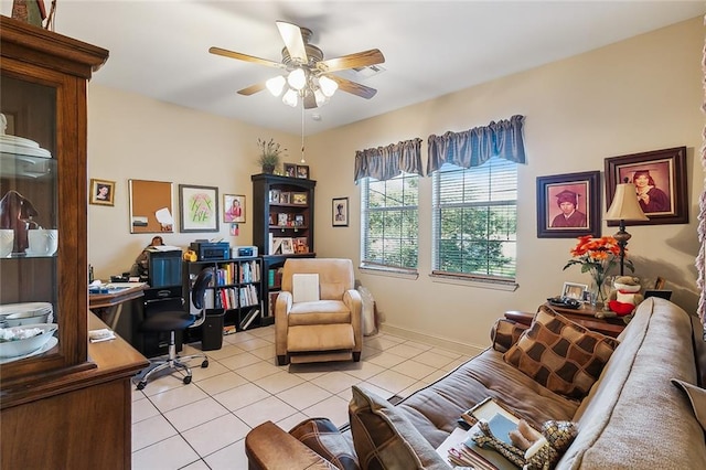 office space with ceiling fan and light tile patterned floors