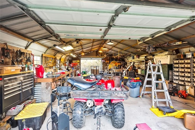 garage with a workshop area