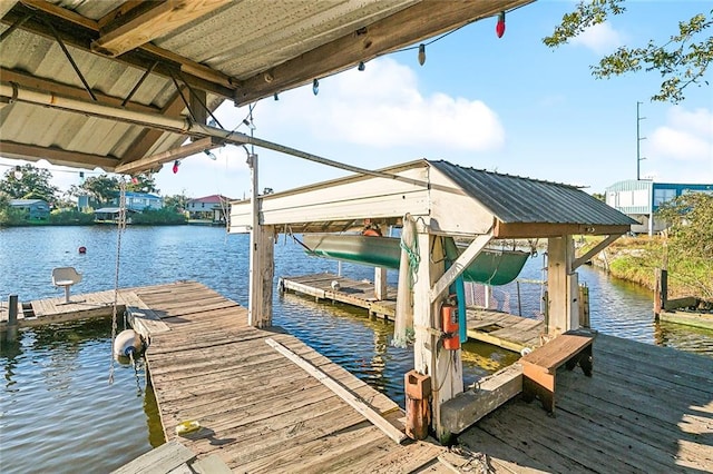 dock area with a water view