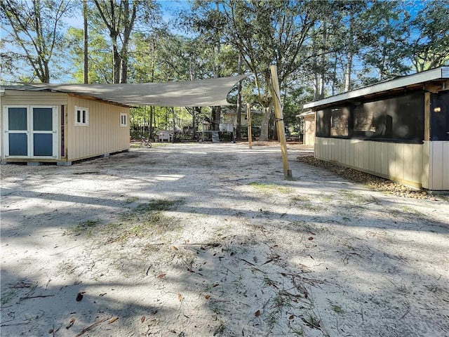 view of yard with a carport