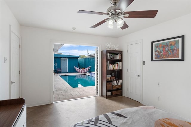 bedroom with access to exterior and ceiling fan