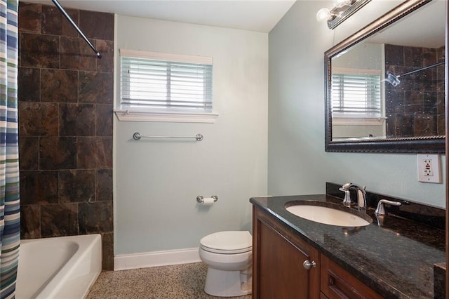 full bathroom featuring shower / bathtub combination with curtain, vanity, and toilet