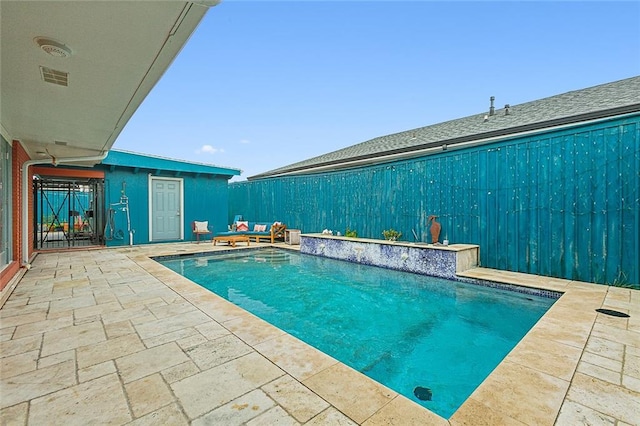 view of pool with a patio