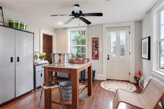 interior space featuring ceiling fan and dark hardwood / wood-style floors