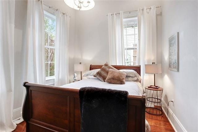 bedroom with wood-type flooring