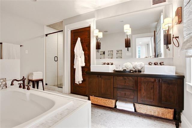 bathroom with vanity and separate shower and tub