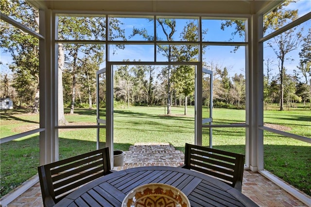 unfurnished sunroom with a healthy amount of sunlight