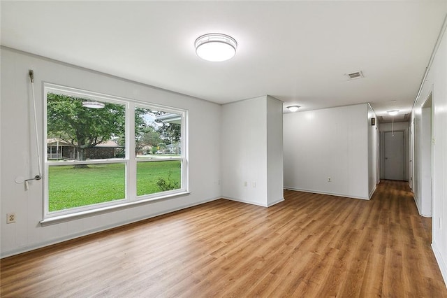 empty room with light wood-type flooring