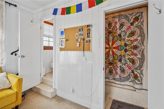 bathroom featuring ornamental molding