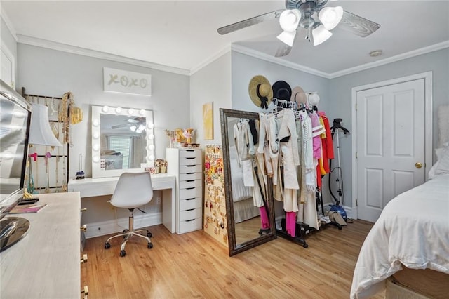 bedroom featuring crown molding, ceiling fan, and light wood-type flooring