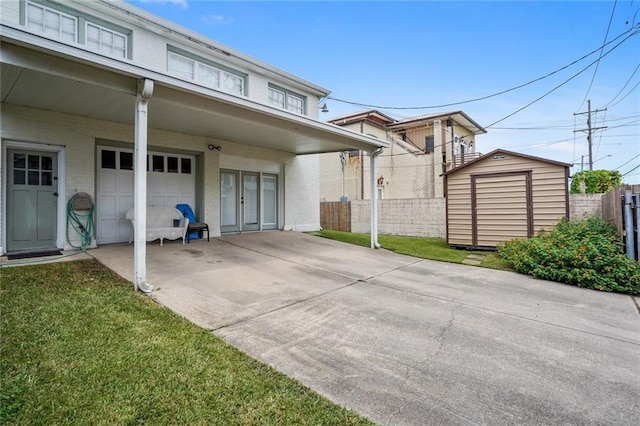 view of patio / terrace with a storage shed