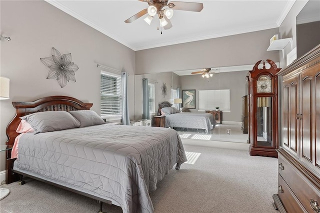 bedroom featuring crown molding, light carpet, and ceiling fan