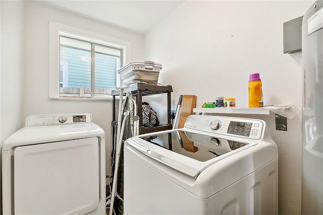 washroom with separate washer and dryer