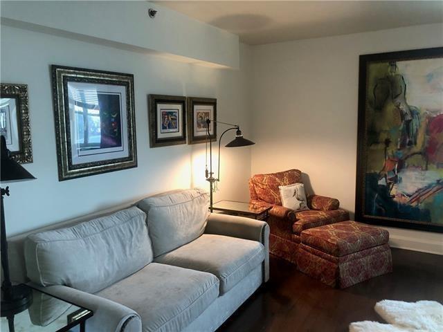 living room with dark wood-type flooring