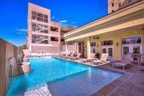 view of swimming pool with a patio area and french doors