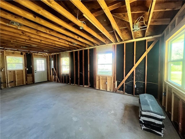 misc room with concrete flooring